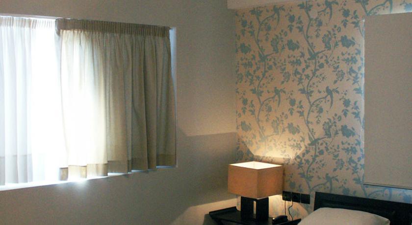 Despotiko Apt. Hotel & Suites Торони Стая снимка